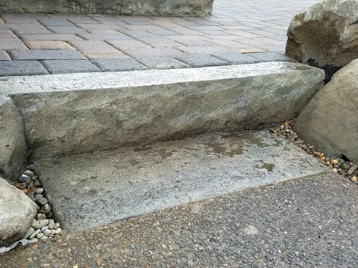 Stamped, stained, or hand-carved concrete work by Earthworks Landscape Service