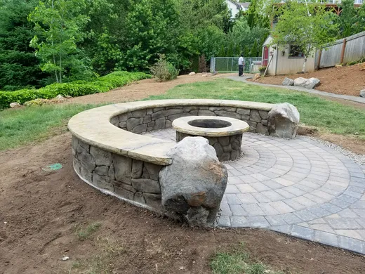 Stamped, stained, or hand-carved concrete work by Earthworks Landscape Service