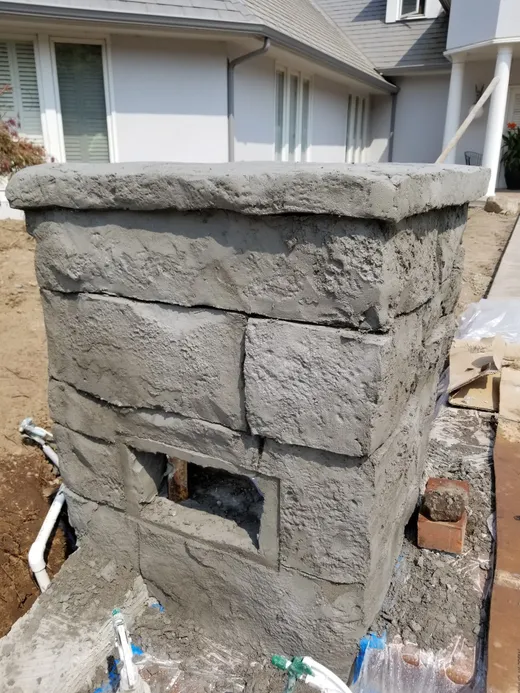 Stamped, stained, or hand-carved concrete work by Earthworks Landscape Service