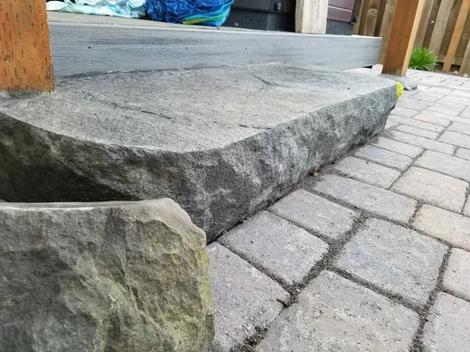 Stamped, stained, or hand-carved concrete work by Earthworks Landscape Service